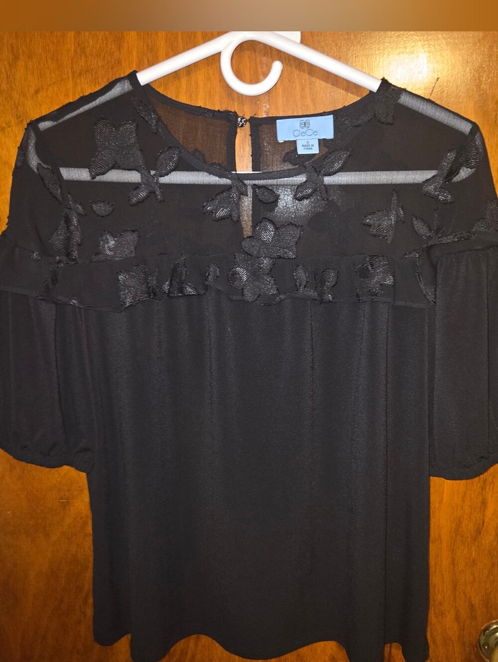 CeCe Black Sheer Yoke Blouse with Floral Appliqué